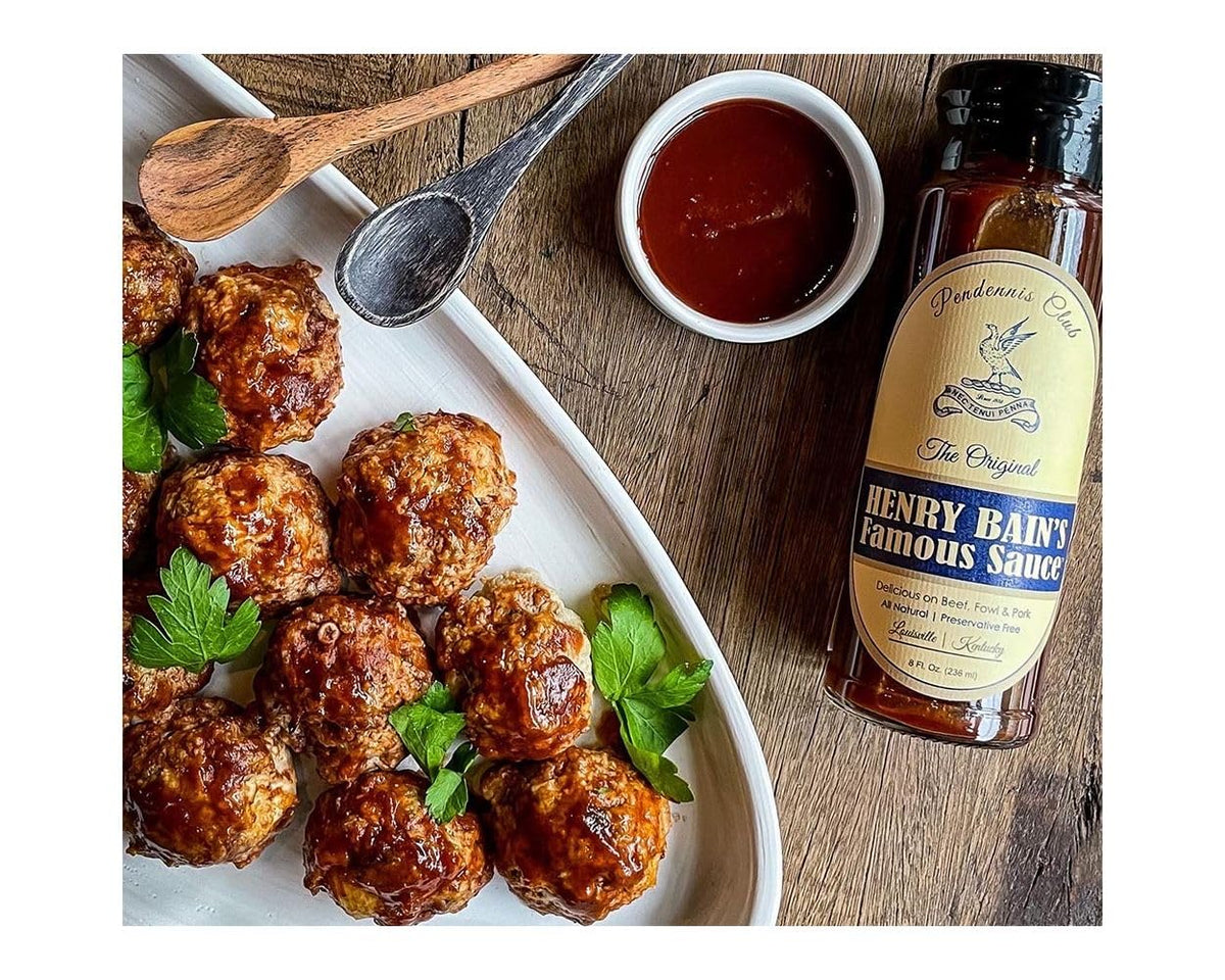 Henry Bain's sauce being poured over tenderloin for a rich finish.