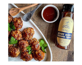 Henry Bain's sauce being poured over tenderloin for a rich finish.