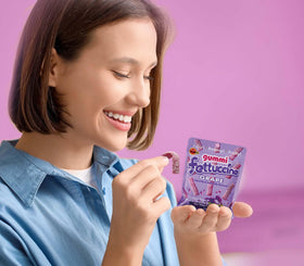 Fettuccine Gummi Grape sour coating adds a bright tart touch.