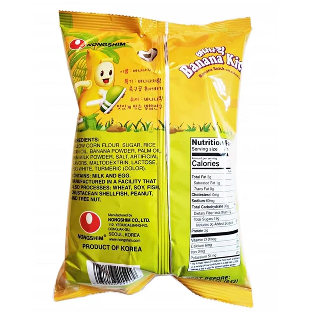 Box of Life Banana Kick Puff pieces on table, perfect for sharing.