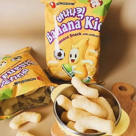Box of Life Banana Kick Puff bags show 1.58 oz portions ideal for lunchboxes.