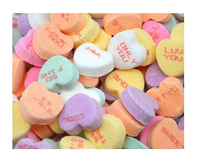 Colorful hearts arranged for dessert decorating on cakes and cookies.