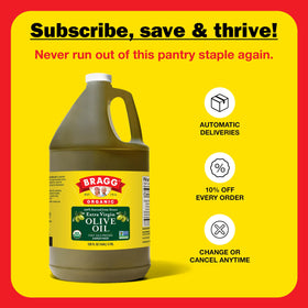 Bragg Non-GMO Kosher Organic EVOO bottle on pantry shelf.