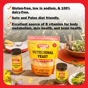 Bragg nutritional yeast seasoning sprinkled on popcorn for a light, savory bite.