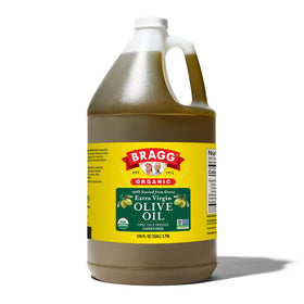 Bragg Organic EVOO bottle with golden oil, ideal for dressings.