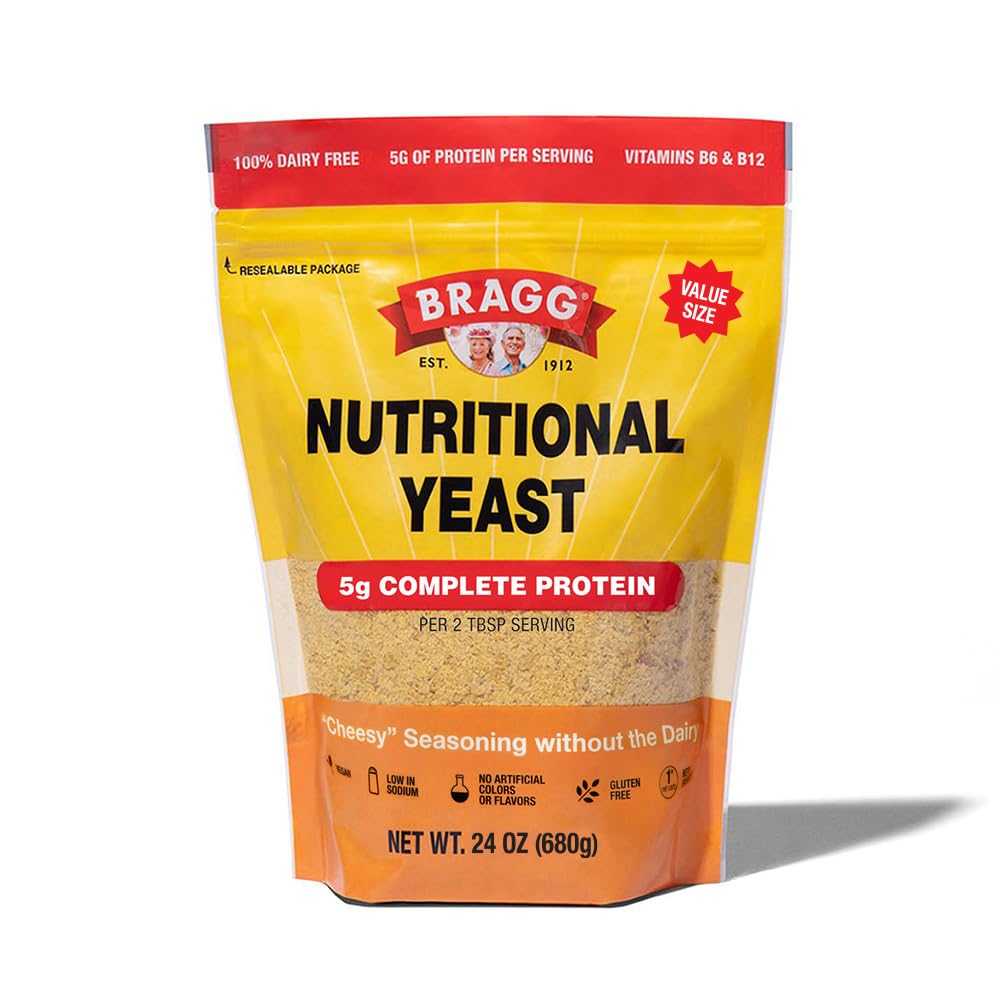 Bragg Premium Nutritional Yeast Seasoning Original in a jar adds savory flavor to dishes.