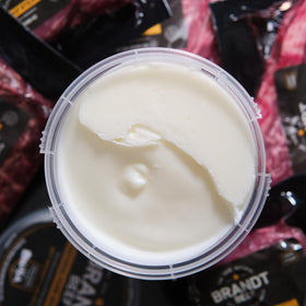 Brandt Beef Tallow in a frying pan delivering a crisp sear.
