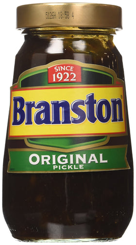 Branston Pickle 520g jar on a kitchen counter, ideal for sandwiches and cold cuts.
