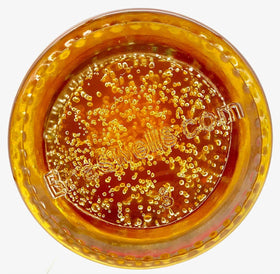 Toast topped with Braswell's Apple Jelly showing a smooth glaze.