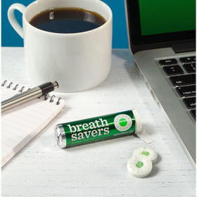 Breath Savers mints in a desk drawer ready for quick breath refreshment.