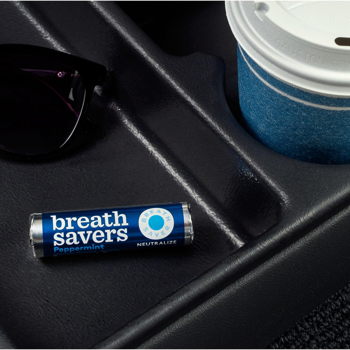 Breath Savers mints on a desk for quick breath refreshment.