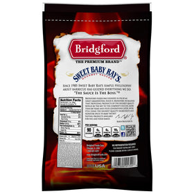 Bridgford jerky closeup highlights glossy teriyaki glaze and beef slices.
