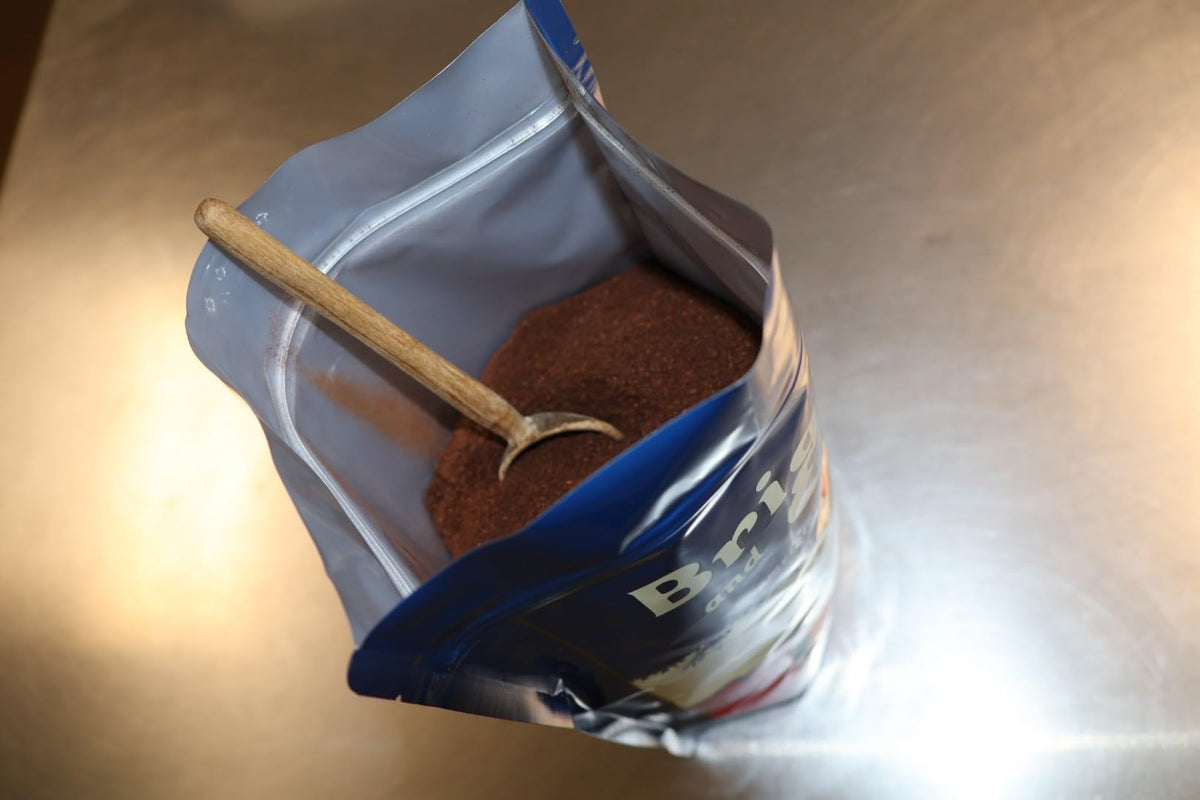 Bright and Early Texas Cinnamon ground coffee pour emphasizes smooth medium roast and cinnamon flavor