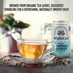 Lifestyle shot of BrightLeaf Sparkling Tea beside a book and candle