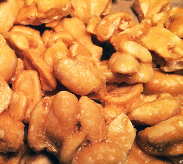 Brittle Brothers close-up reveals abundant nuts and caramel crunch.