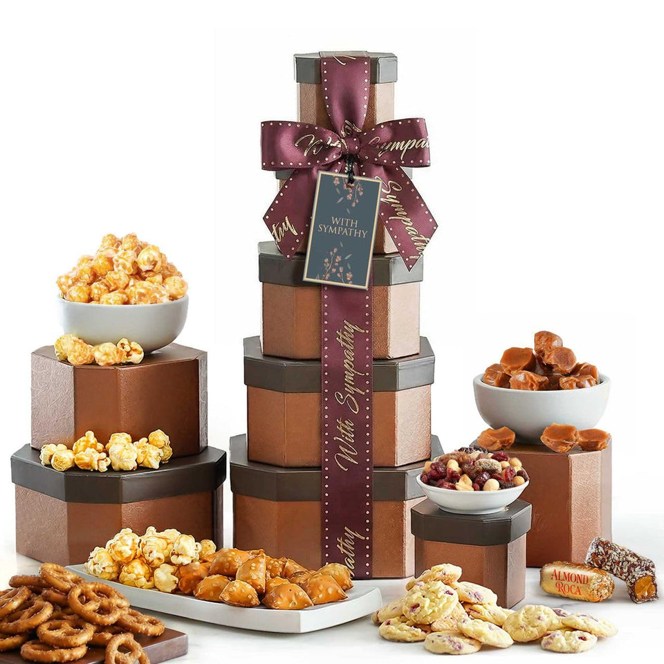 Broadway Basketeers sympathy gift basket tower, elegant tiered presentation for condolence gifting.