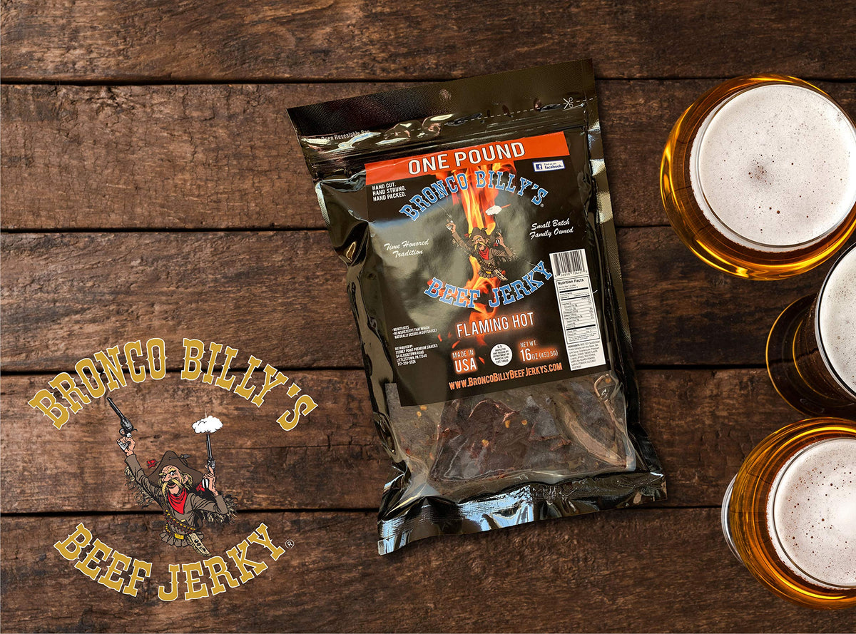 Bronco Billy's Flaming Hot beef jerky close-up seasoning detail emphasizes intense heat without sacrificing texture