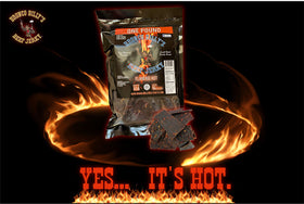 Bronco Billy's Flaming Hot beef jerky slices close-up highlights fiery seasoning for bold snacking