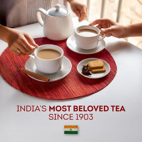 Brooke Bond Red Label steaming cup highlights brisk, robust flavor.