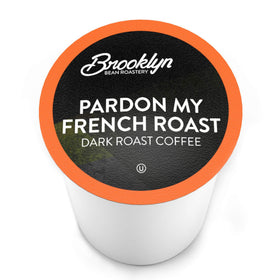 Brooklyn Beans French Roast pods closeup highlights rich aroma and premium quality.