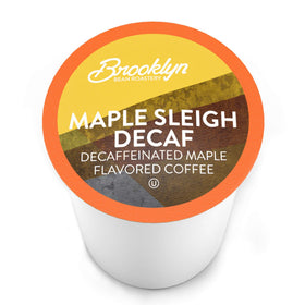 Close-up of Maple Sleigh Decaf pod shows rich aroma and maple flavor.