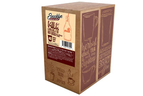 Brooklyn Beans Milk Chocolate pod dispensing into a mug for indulgence.