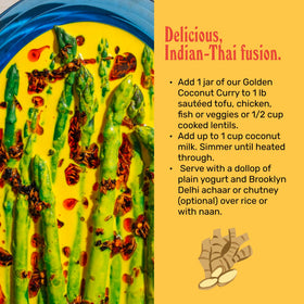 Cooktop pan with Brooklyn Delhi Golden Coconut Curry glowing with vibrant color