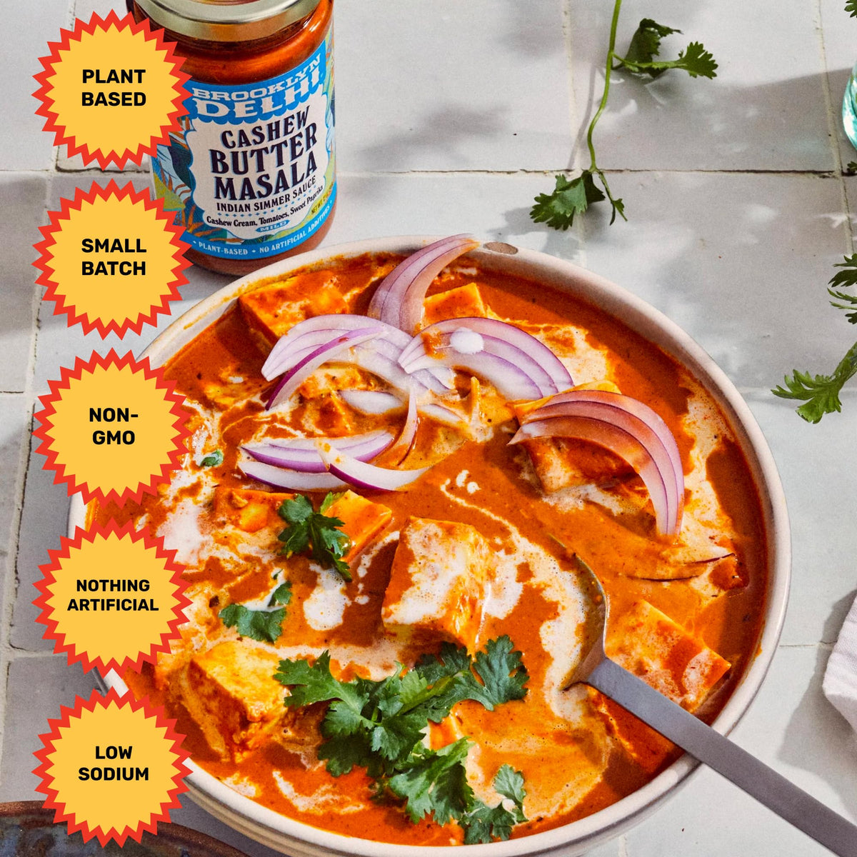 Brooklyn Delhi Golden Coconut Curry simmering in pot suggests depth and cozy flavor