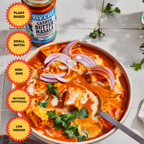 Brooklyn Delhi Golden Coconut Curry simmering in pot suggests depth and cozy flavor