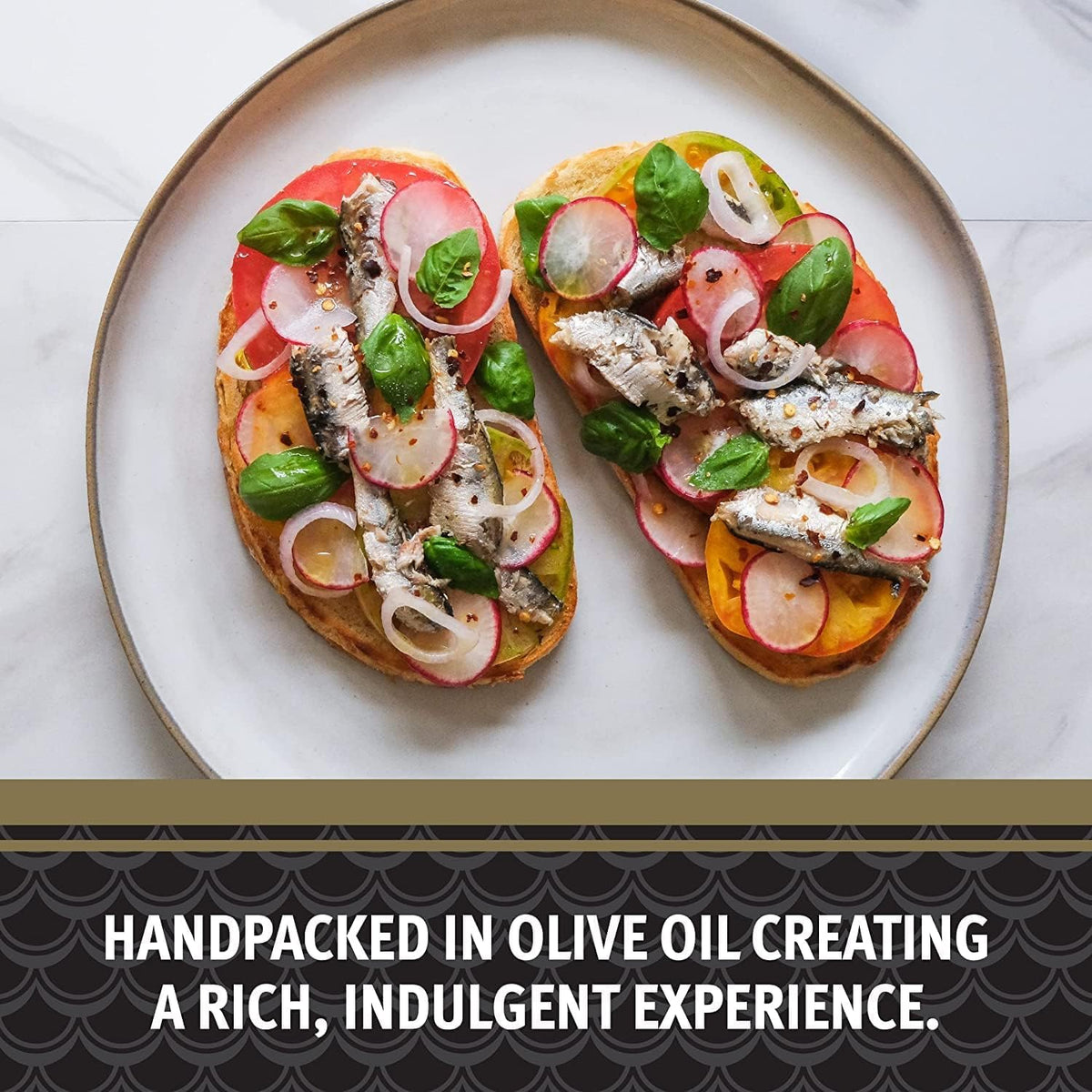 Brunswick sardines plated on greens or toast with olive oil drizzle.