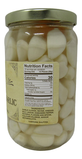 Buc-ee's Pickled Habanero Garlic bulbs on spoon delivering crunchy, tangy heat