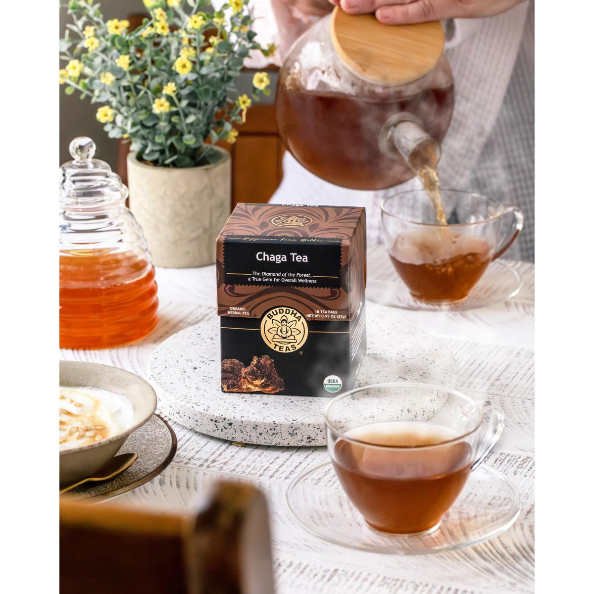 Buddha Teas Chaga Tea infuser scene suggesting ritual brewing.