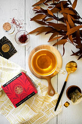 Buddha Teas saffron green tea cup steam—captivating ritual with caffeine to uplift.