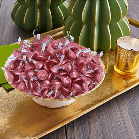 Buha Sweets baby shower favors featuring pink foil wrapped chocolates.