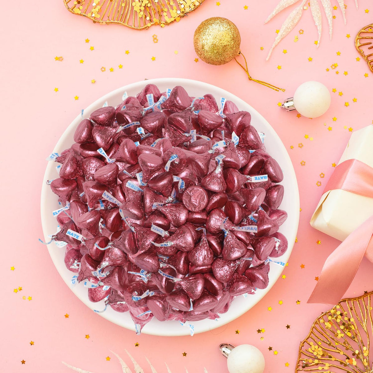 Buha Sweets candy jars and dessert buffets with bright pink wrappers.