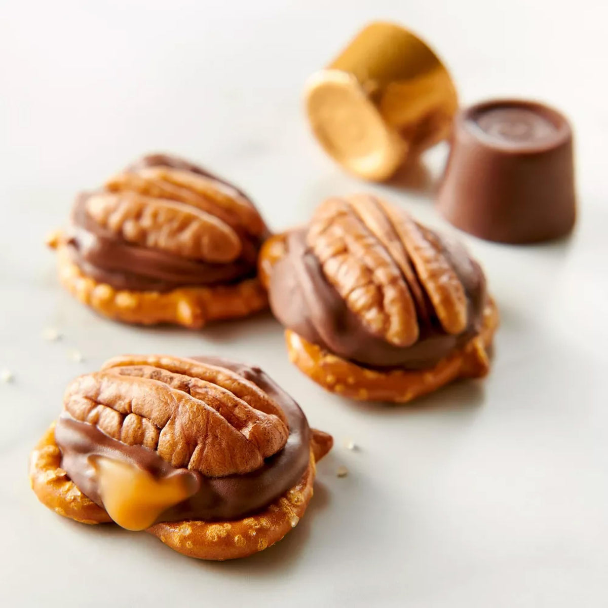 Buha Sweets caramel chocolate candy display at buffet or snack station, adds elegance