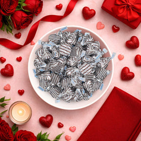 Closeup of Buha Sweets Milk Chocolate Hugs showing creamy white crème swirl.