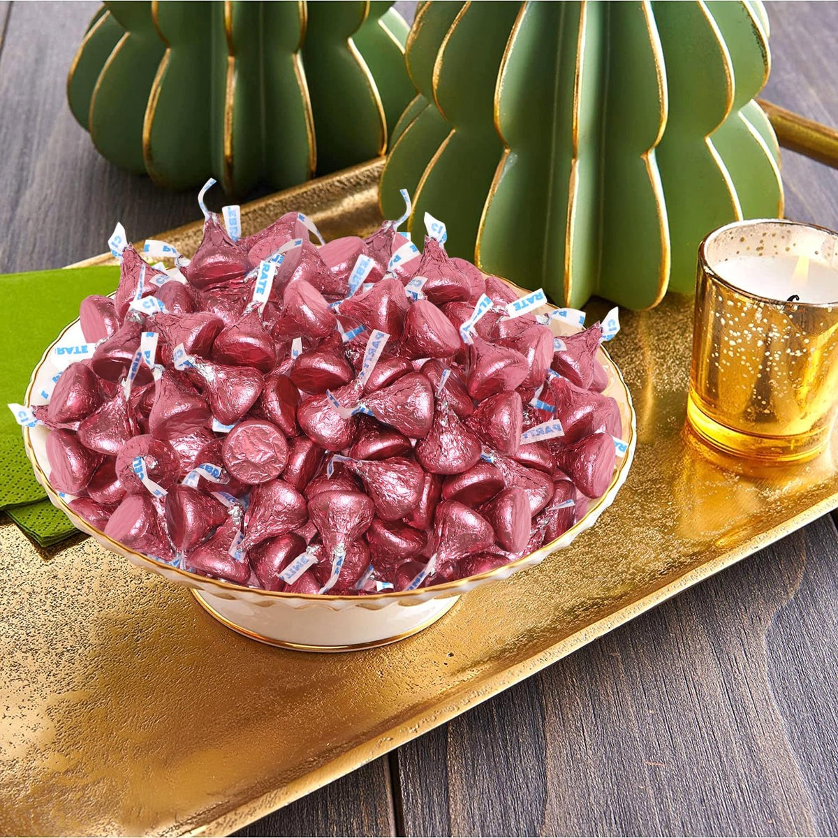 Pink-wrapped Buha Sweets chocolates displayed in a bowl for easy serving