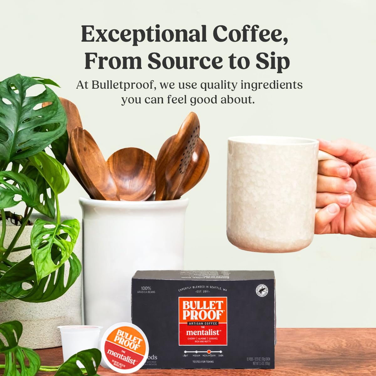 Steaming cup of Bulletproof The Mentalist brew with inviting medium-dark roast aroma.