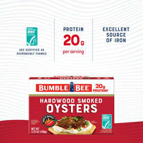Bumble Bee hardwood smoked oysters in a tin, close up on rich sauce.