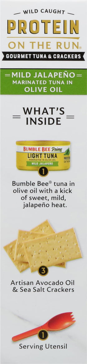 Serving utensil helps place tuna on crackers neatly.