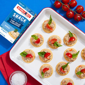 Bumble Bee Snack On The Run kit in a lunchbox, ideal on-the-go meal.