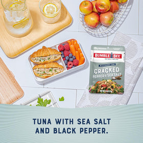 Bumble Bee tuna pouch on a salad bowl for a protein boost