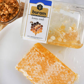 Close-up of Buram honeycomb reveals hexagonal texture and artisan craftsmanship.