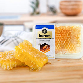 Buram honeycomb with tea enhances hot beverages with natural sweetness.