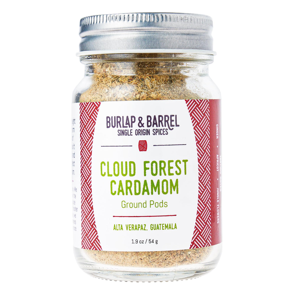 Burlap and Barrel Cloud Forest Cardamom pods in glass jar add bright flavor to desserts.