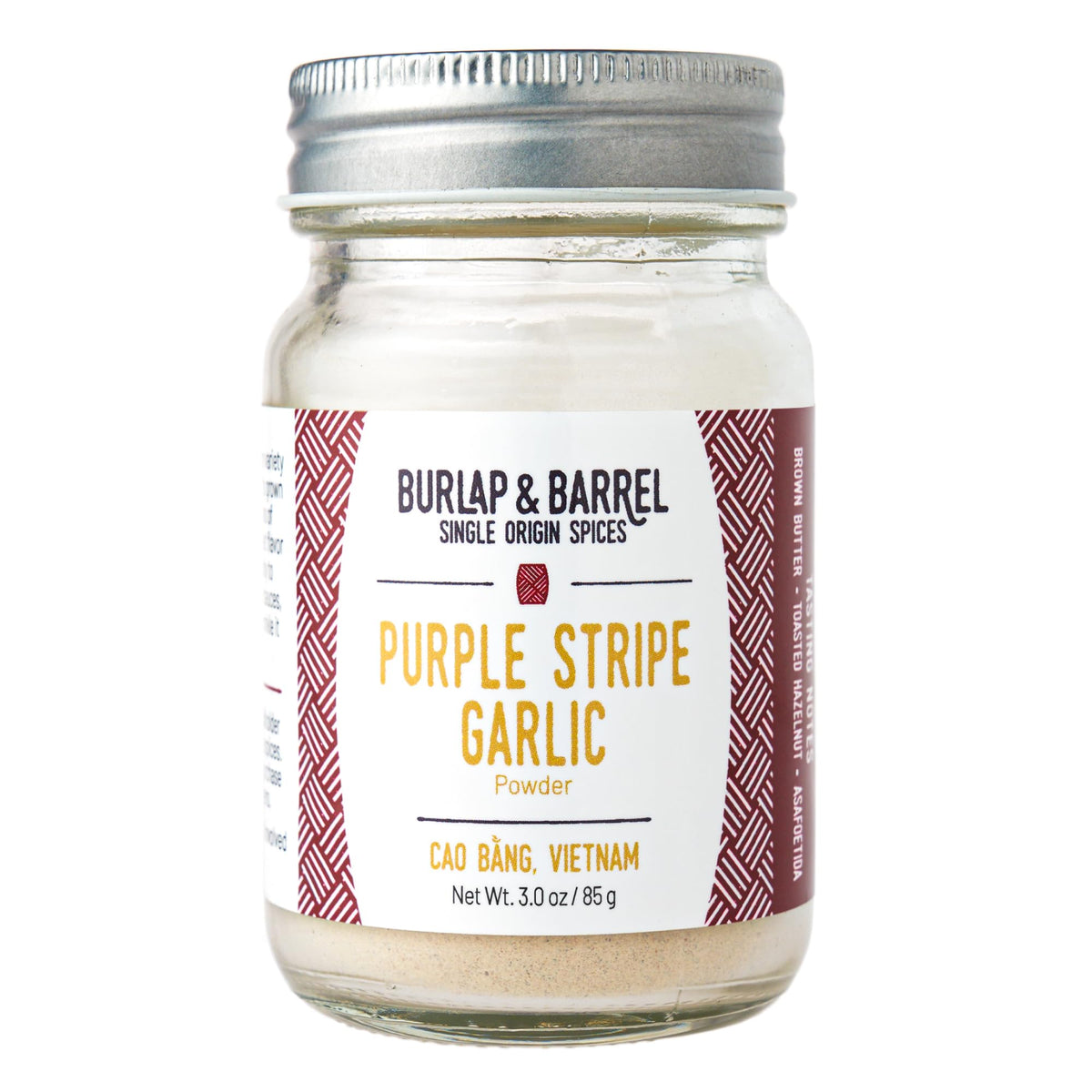 Burlap & Barrel Purple Stripe Garlic Powder jar adds savory depth to sauces.