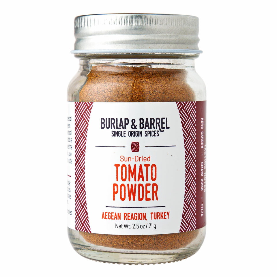 Burlap and Barrel sun-dried tomato powder bottle on kitchen counter adds savory depth.