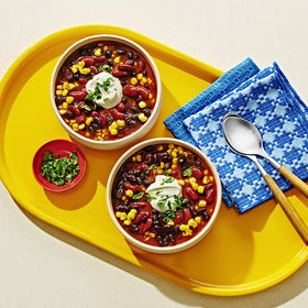 Beans simmering in a pot, Bush's Best for flavorful meals.