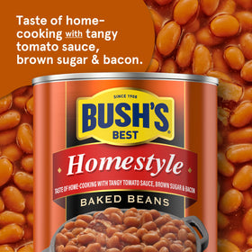 Spoon serving Bush's Best Homestyle Baked Beans with tangy sauce
